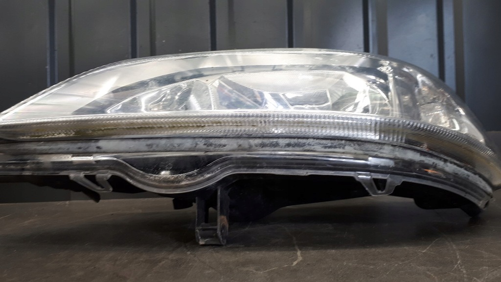 90520877 Lewy προβολέας Opel Astra II G Hella Product image