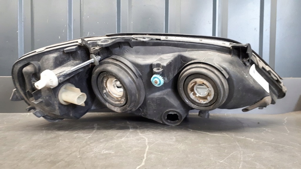 90520877 Lewy προβολέας Opel Astra II G Hella Product image