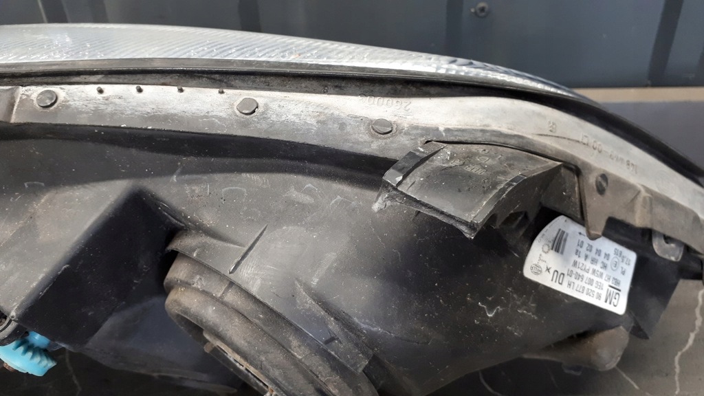 90520877 Lewy προβολέας Opel Astra II G Hella Product image
