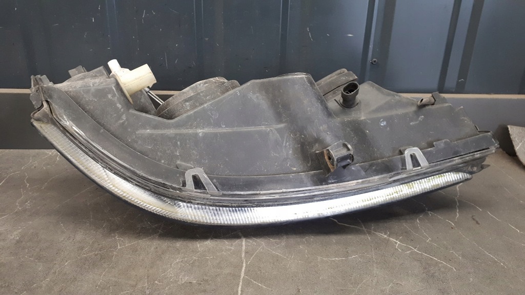90520877 Lewy προβολέας Opel Astra II G Hella Product image