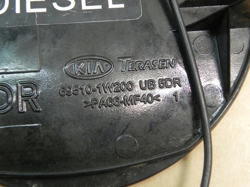 KIA RIO III 3 11-16 ABP FUEL FILLER FLAP 69510-1W200 Product image